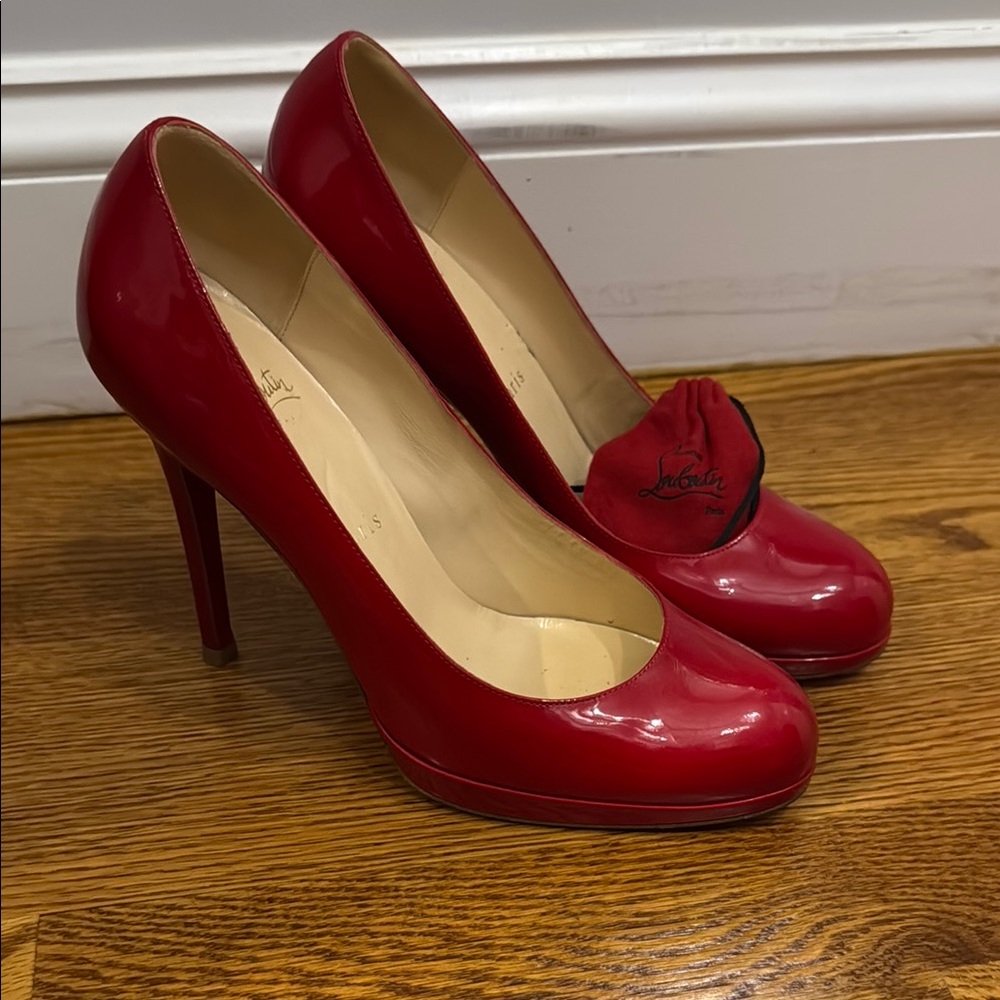 Christian Louboutin Red Heels with Glossy patent Finish